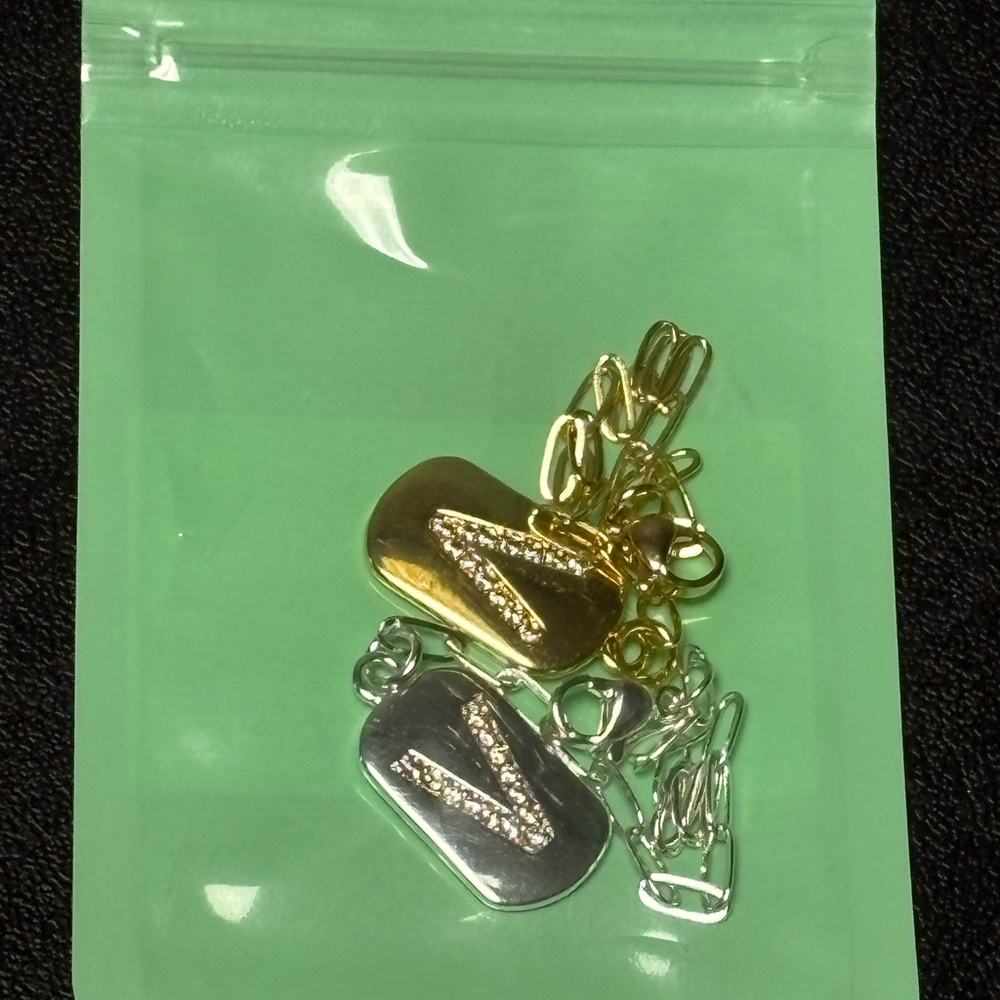 “V” Gold and Silver Charms